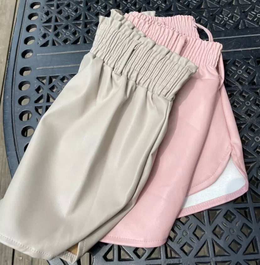 Pink leather look shorts