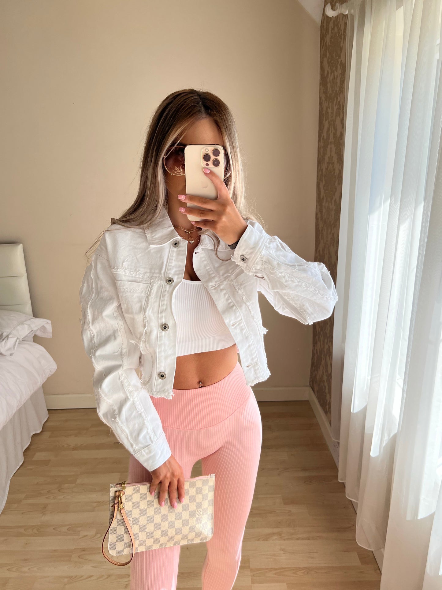 White ripped jeans jacket