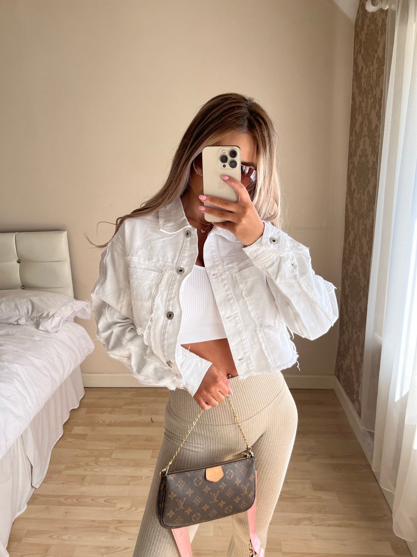 White ripped jeans jacket