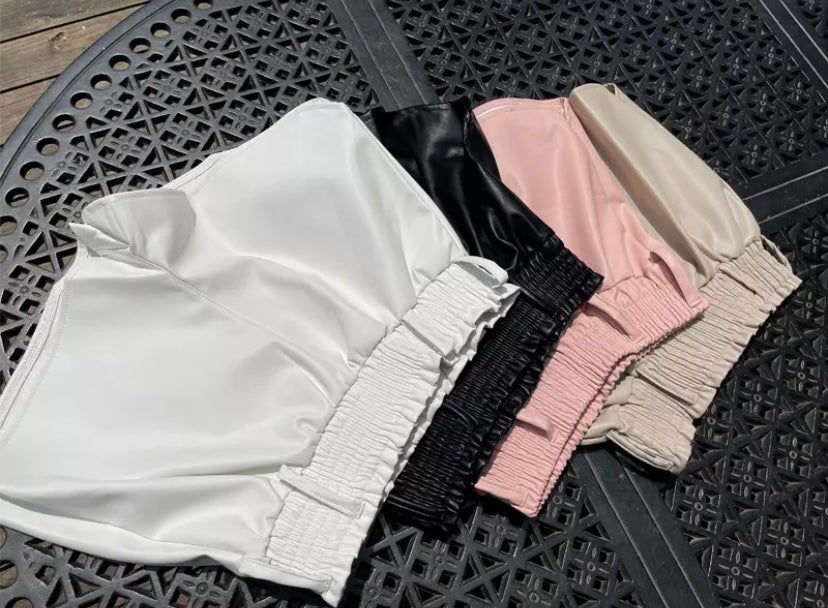 Pink leather look shorts